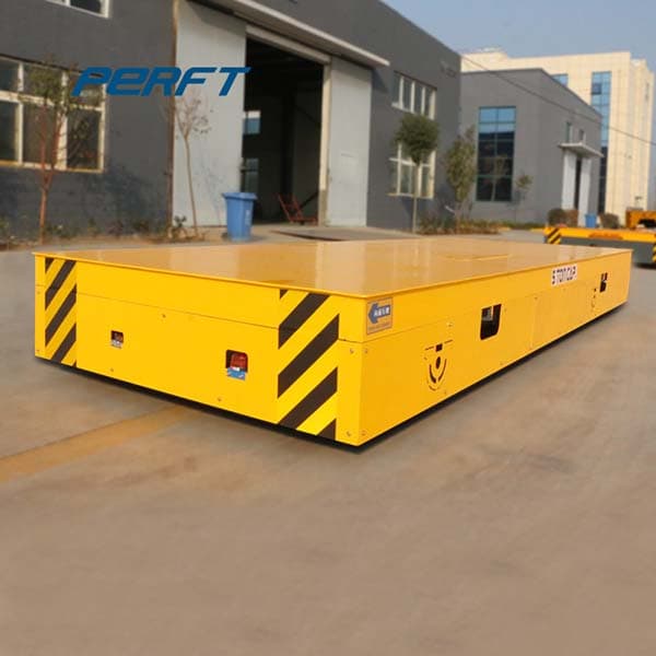 motorized rail transfer trolley with fork lift pockets for transporting 80 tons